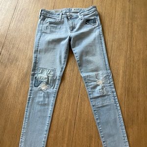 AG the Legging Ankle distressed and patched jeans